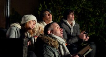 family looking at the night sky