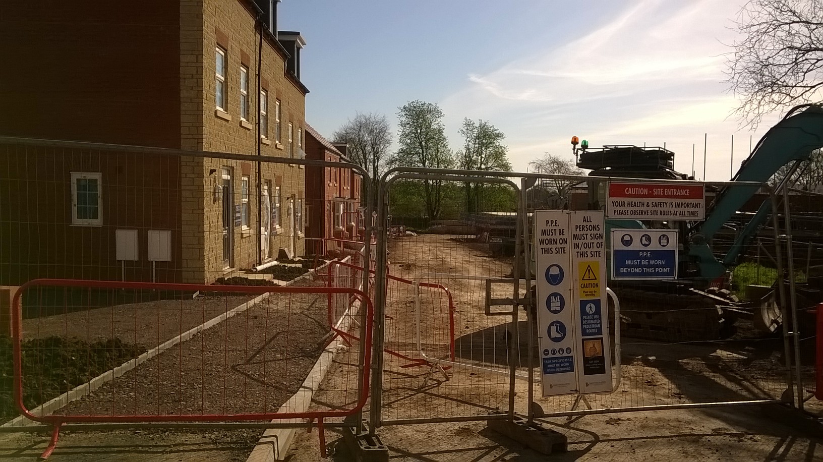 building site behind fence